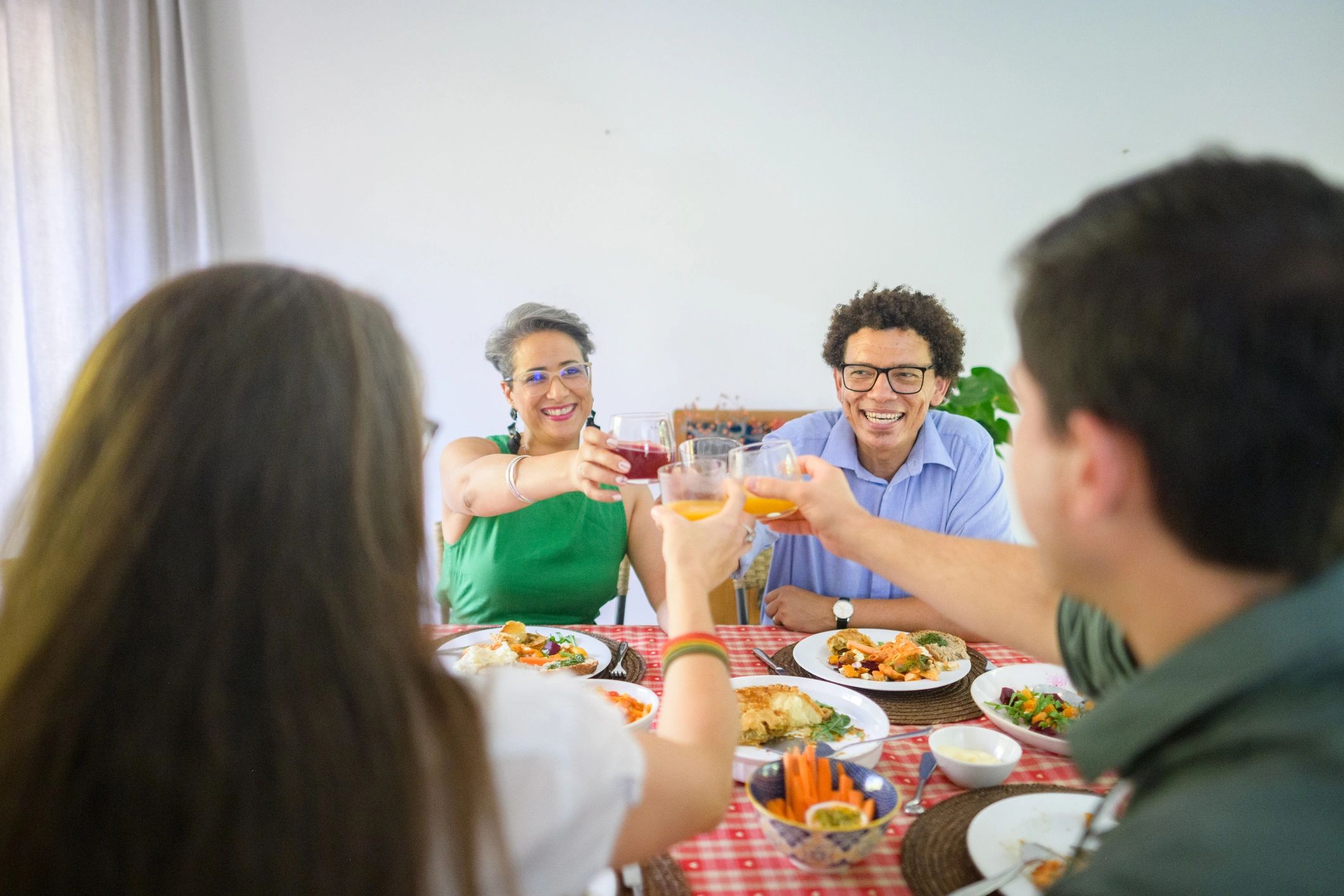 Friends gathered around a table for a cozy game night