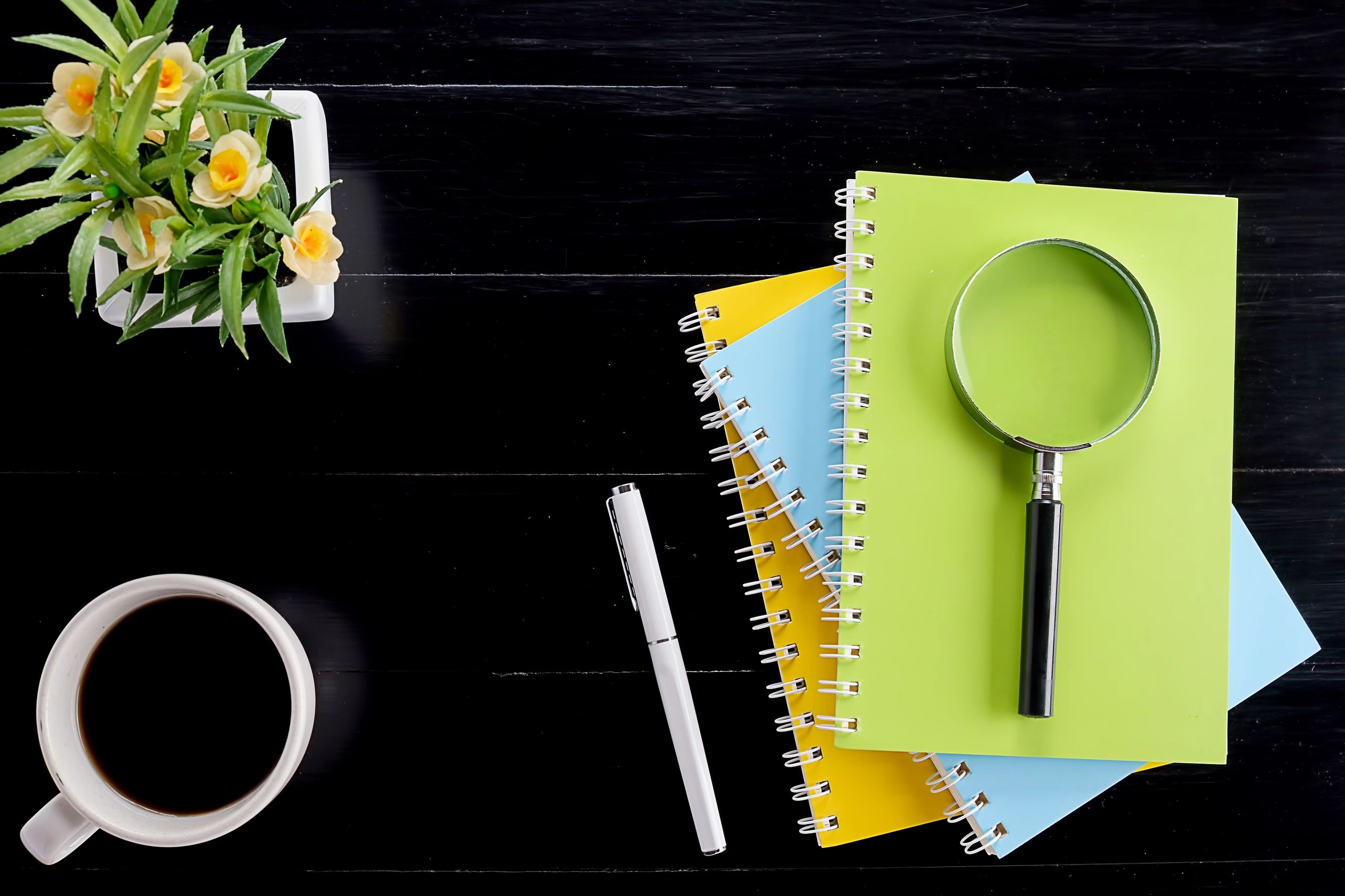Printable mystery papers and stationery arranged on a desk